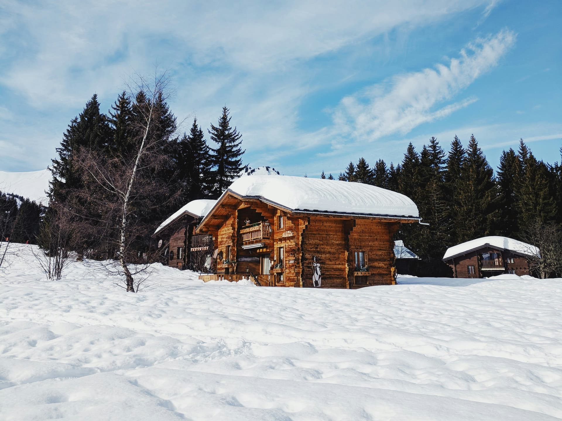 france-wooden-chalet-snow-blue-sky