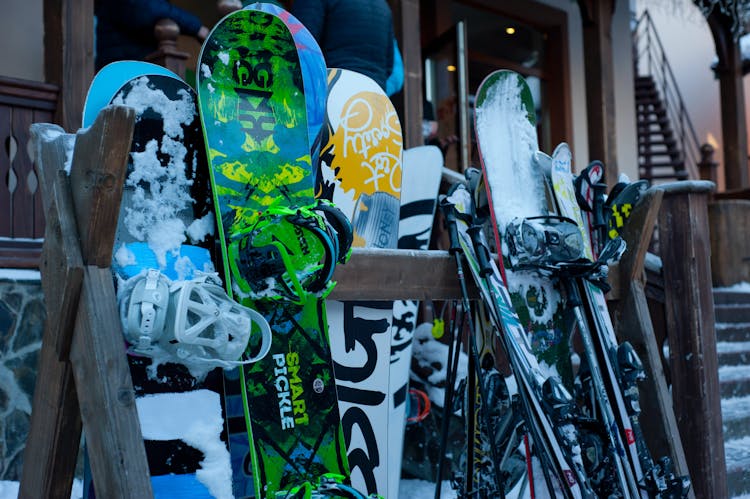 Snowboards on rack outside apres bar