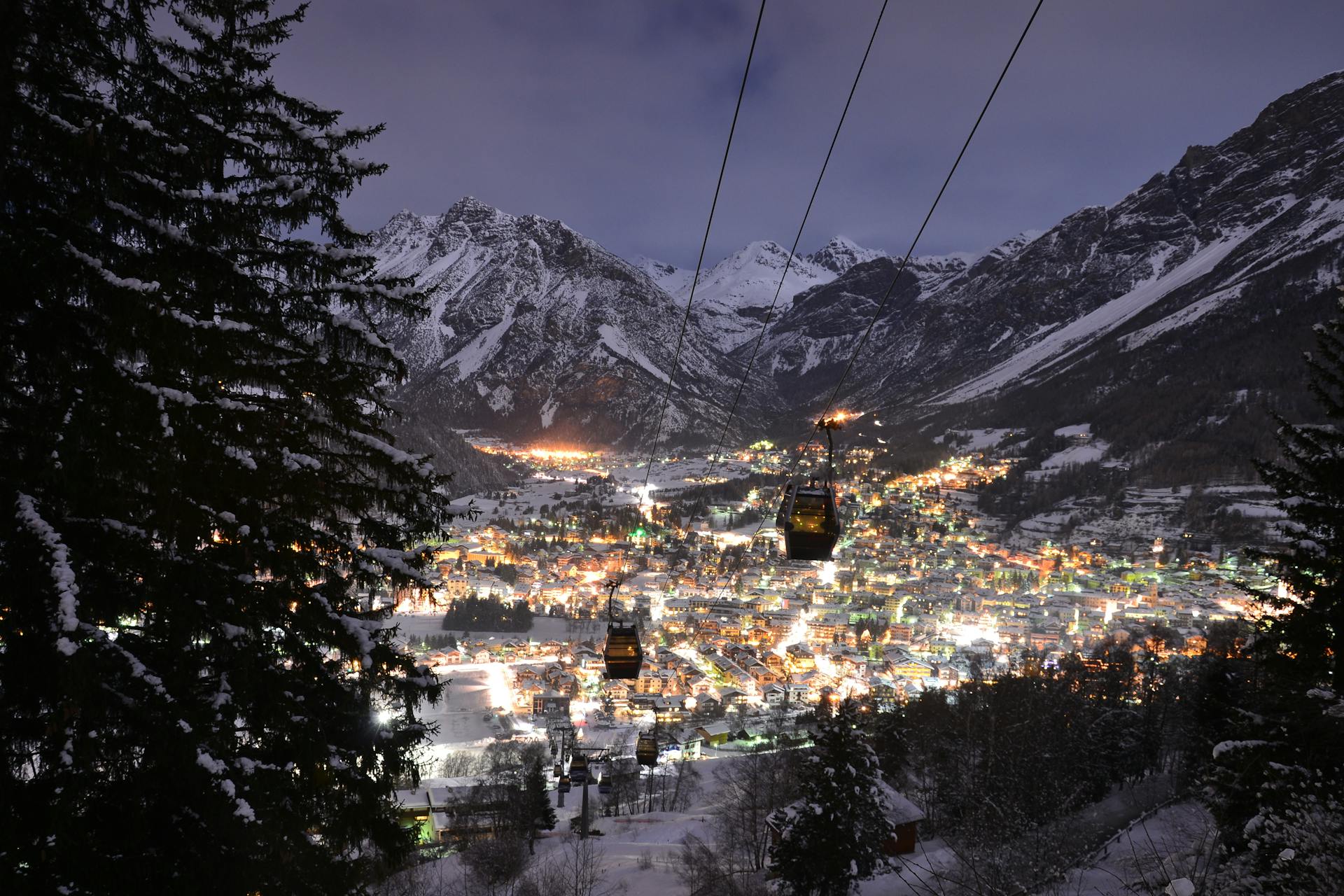 Bormio holiday ski resort lit up by lights at night