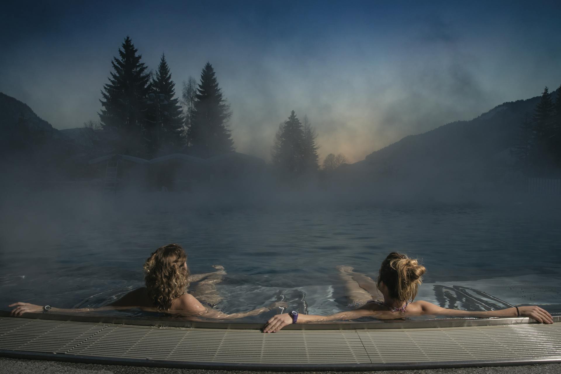 Couple enjoying thermal spa hot tub at Megeve ski resort