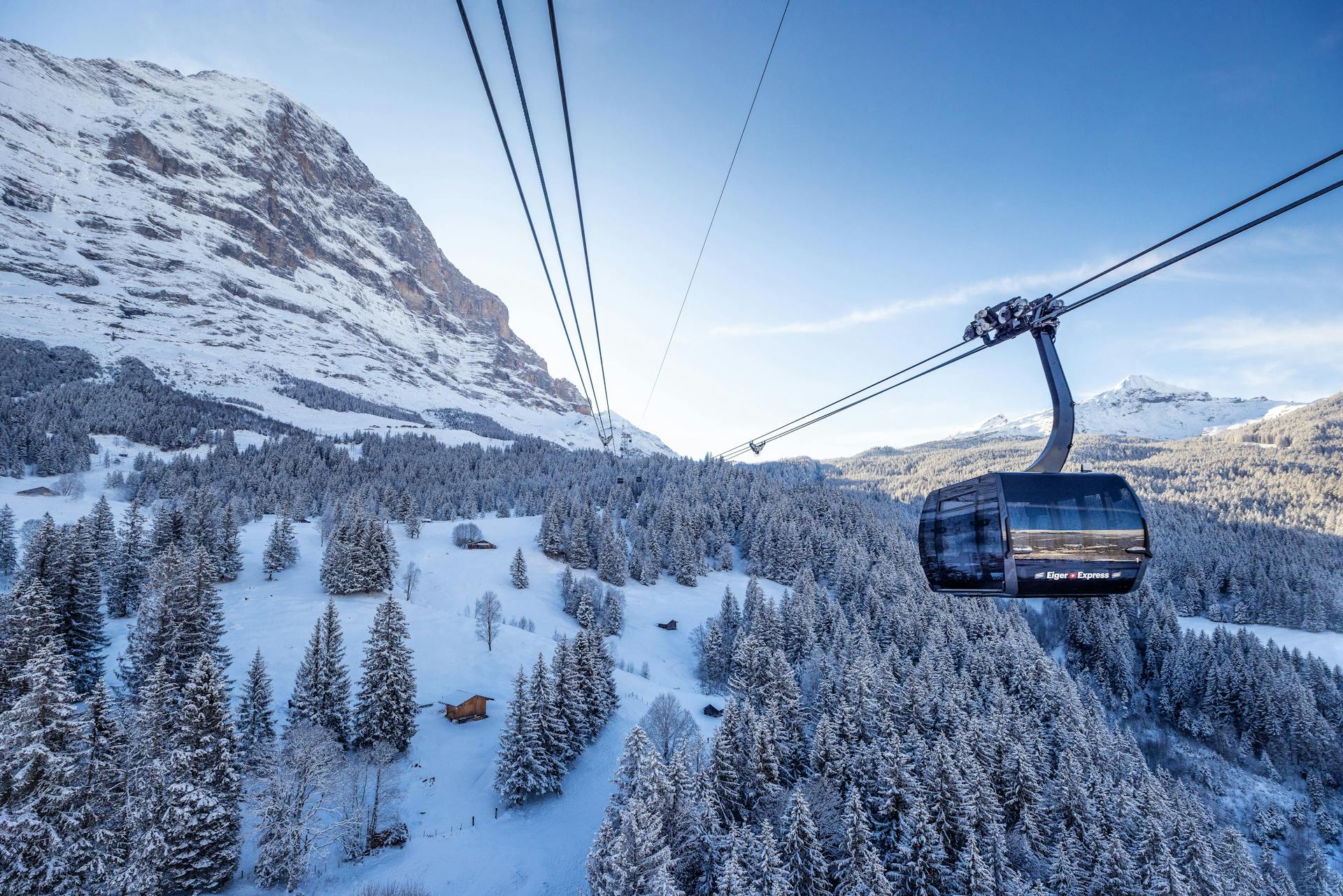 Gondola taking skiiers to top of mountain