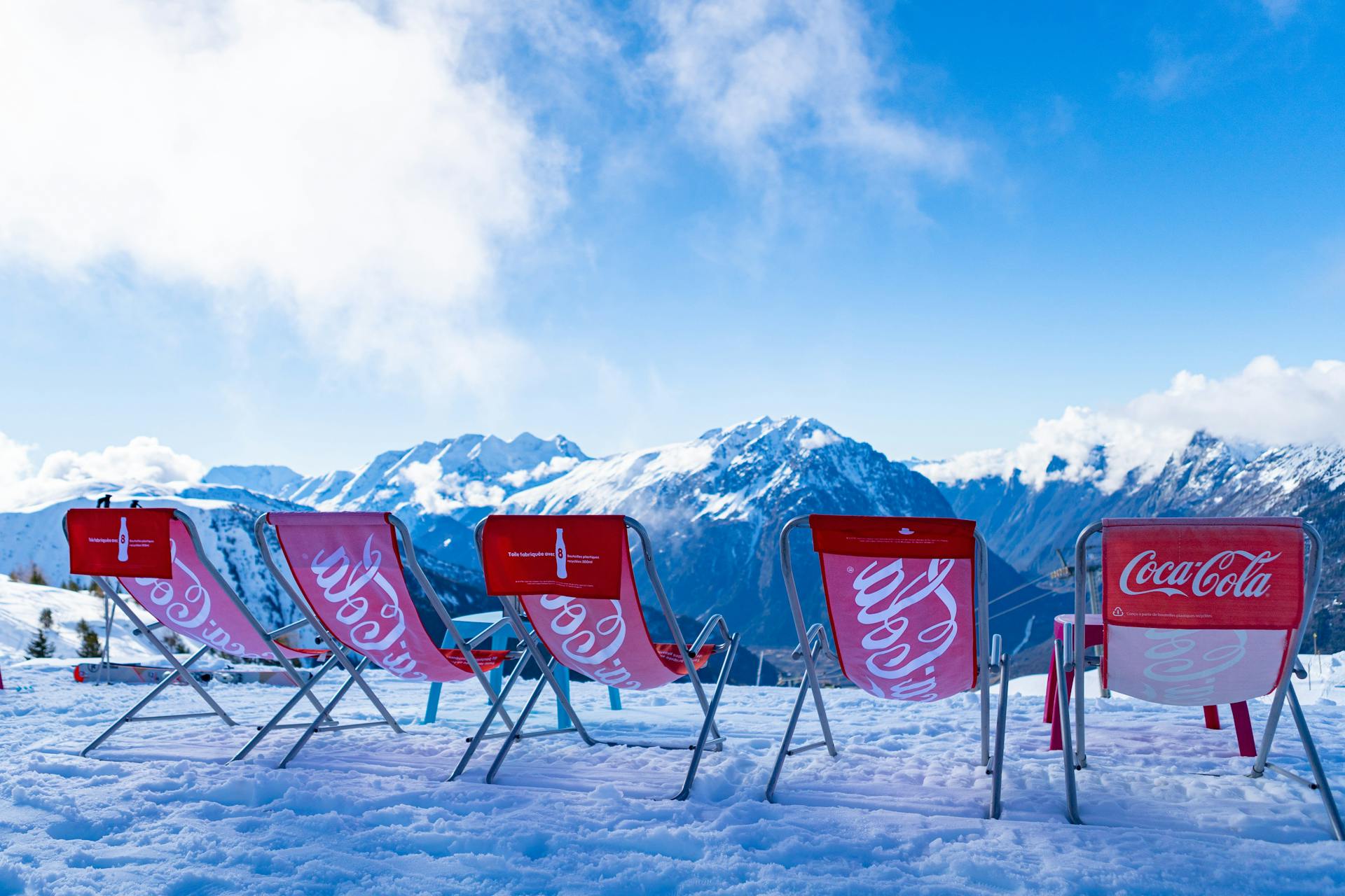 Lounge chairs with view of snowy mountains