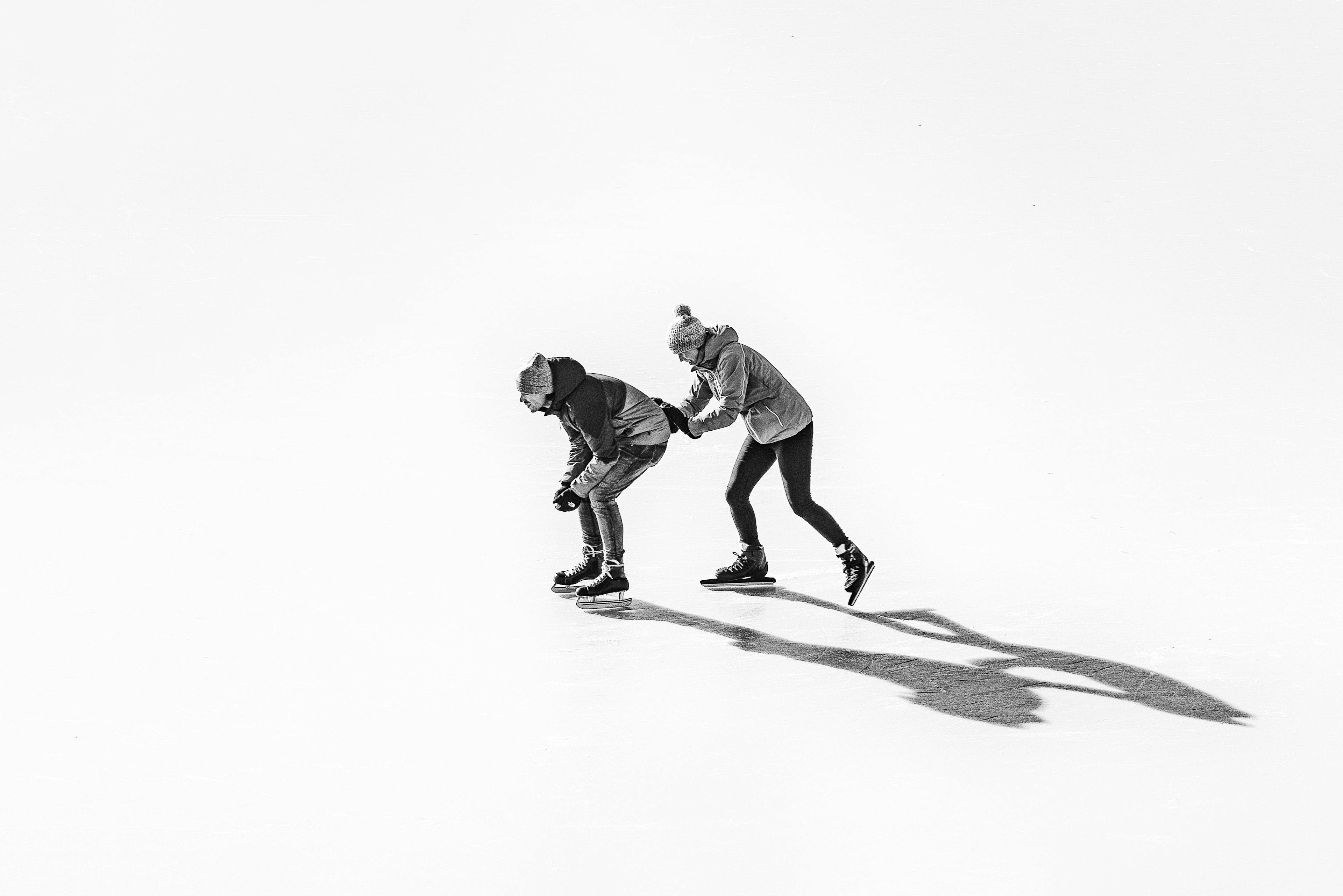 Couple ice skating together in Austria