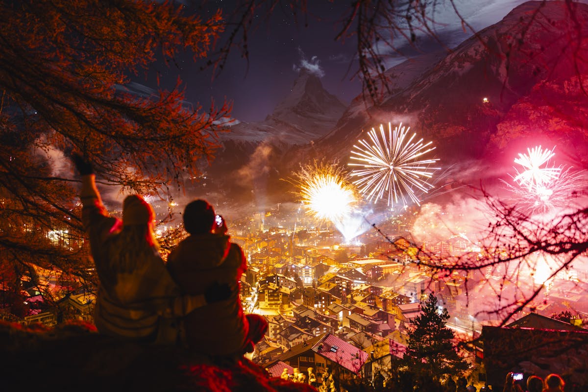 Friends watch Zermatt fireworks at night