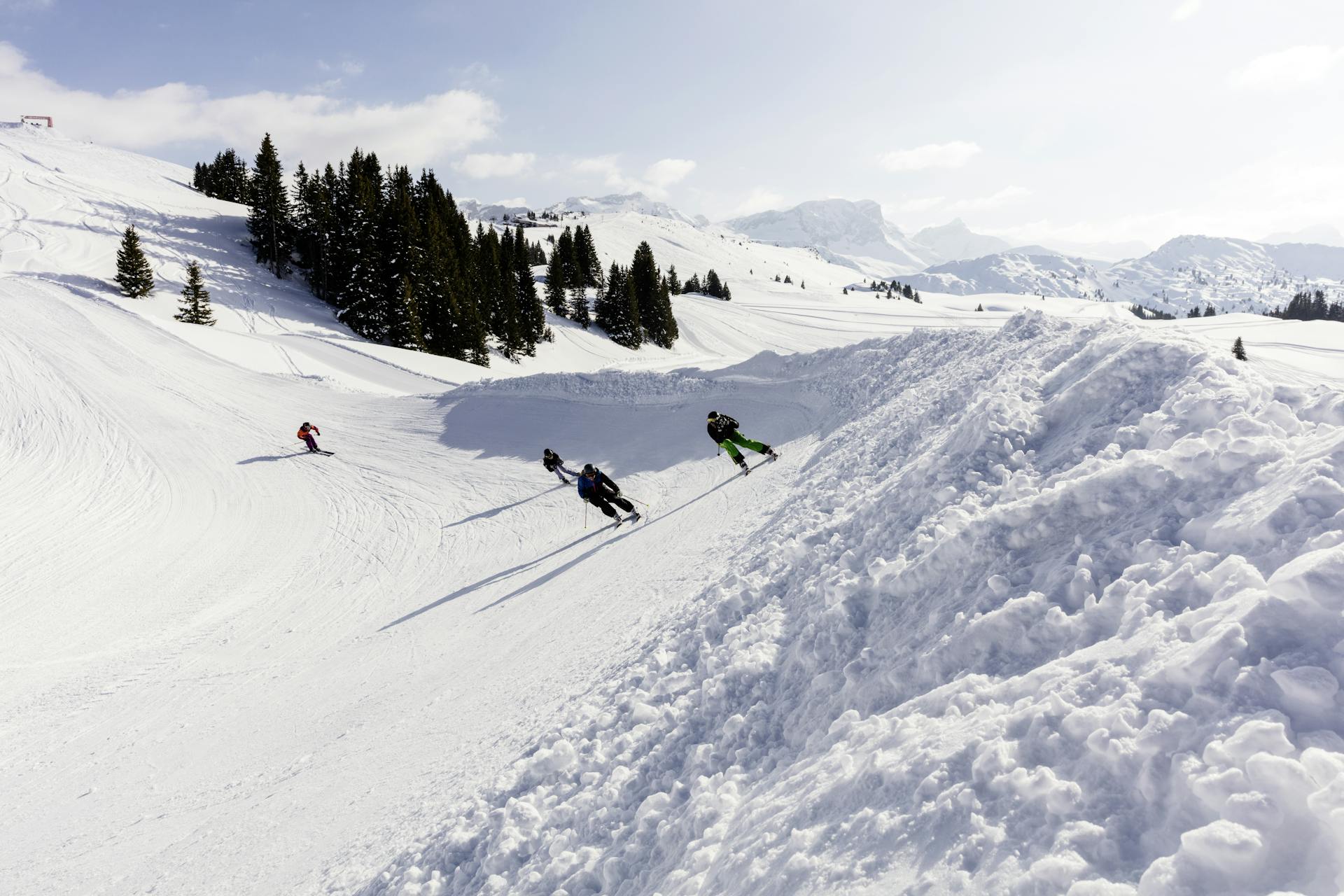 skiers enjoying sunny slopes