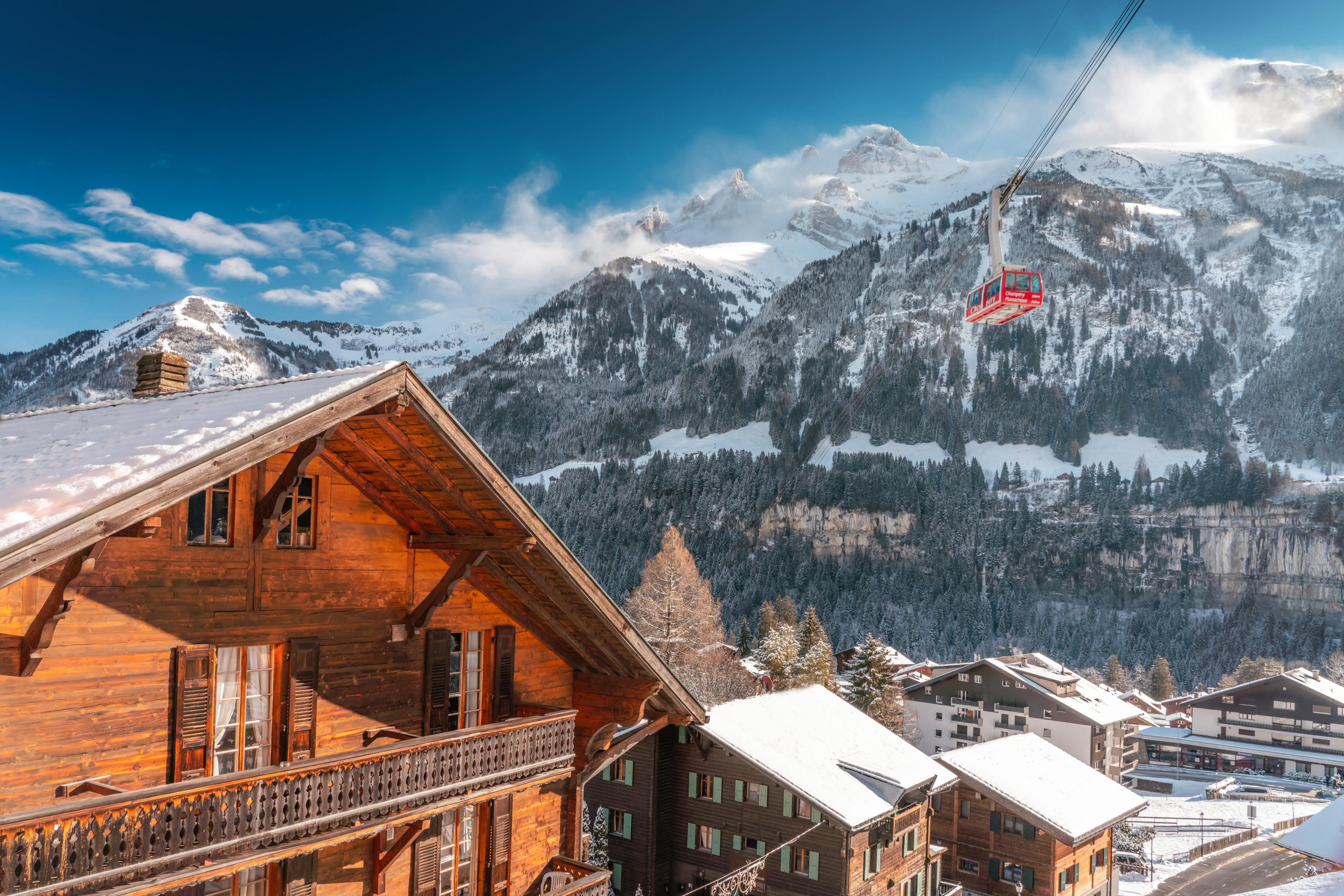 champery chalets and snowy mountains